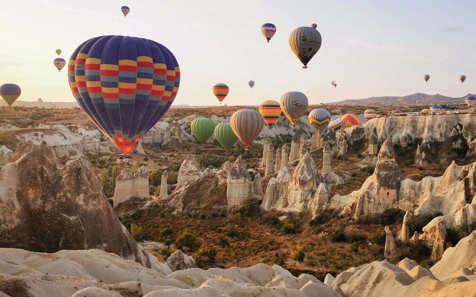 Rise over the fairy chimneys at sunrise by balloon