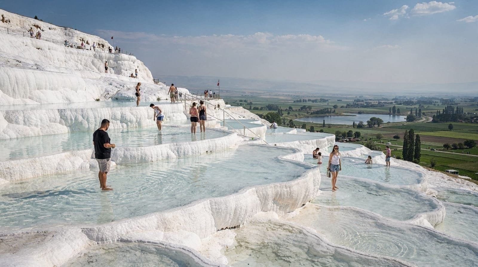 Walk barefoot up the white travertine terraces