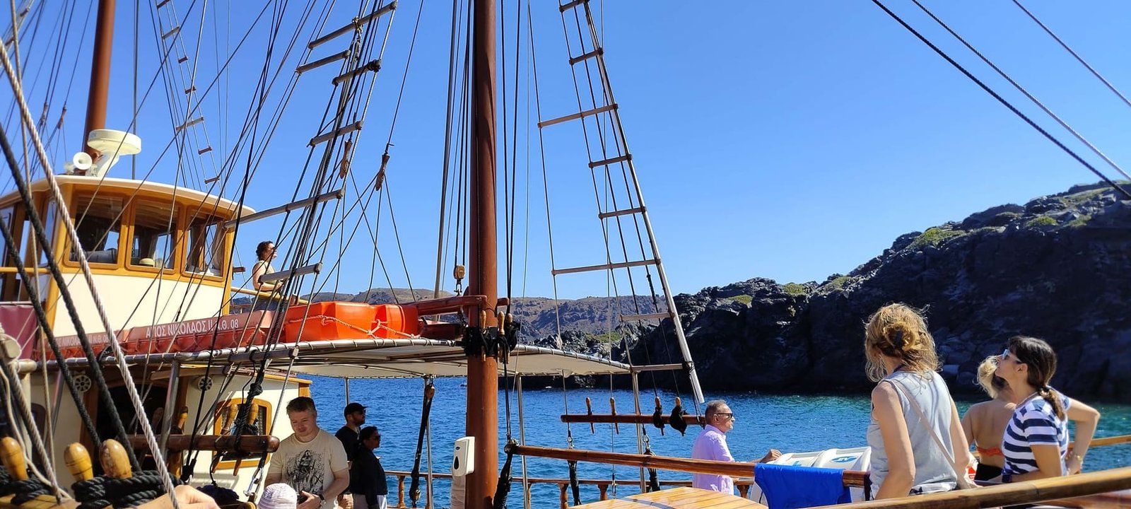 Sail the caldera to a smoking crater and hot springs
