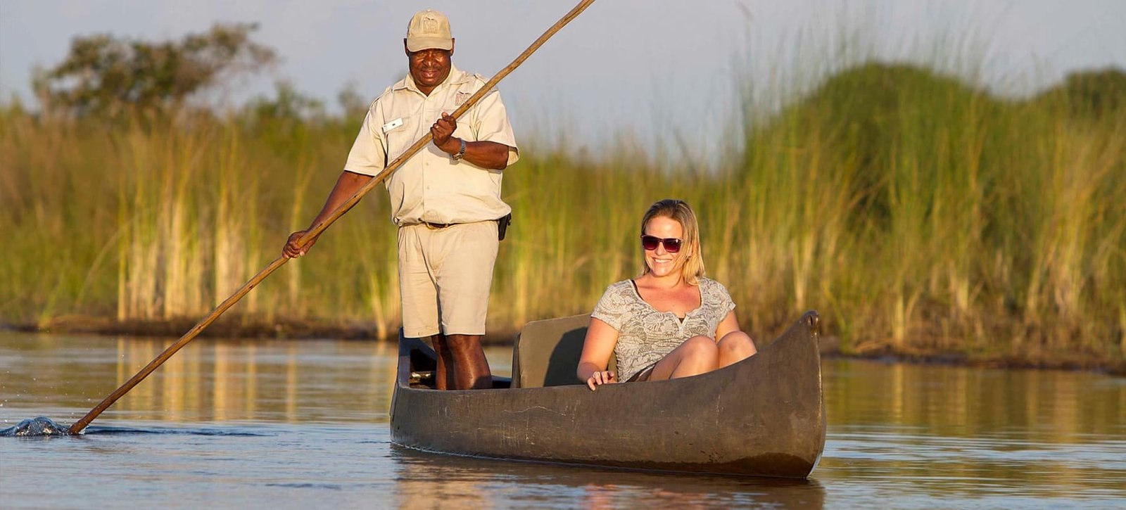 Glide silently through the Delta by traditional mokoro canoe