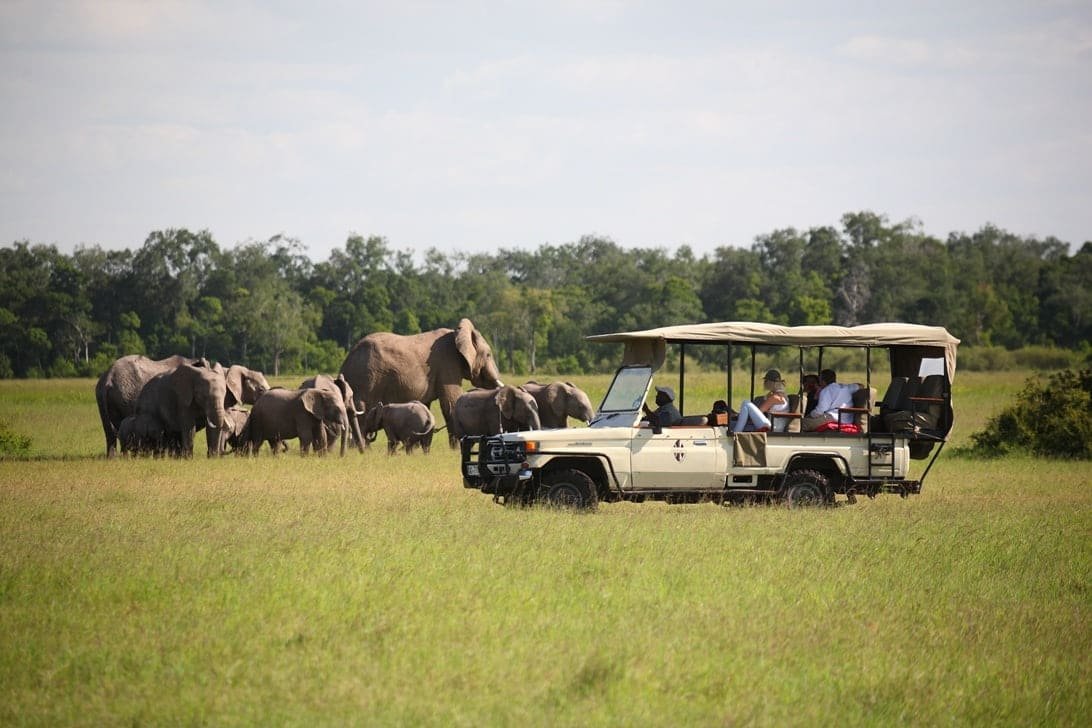 Tented suites above a river in the Maasai Mara