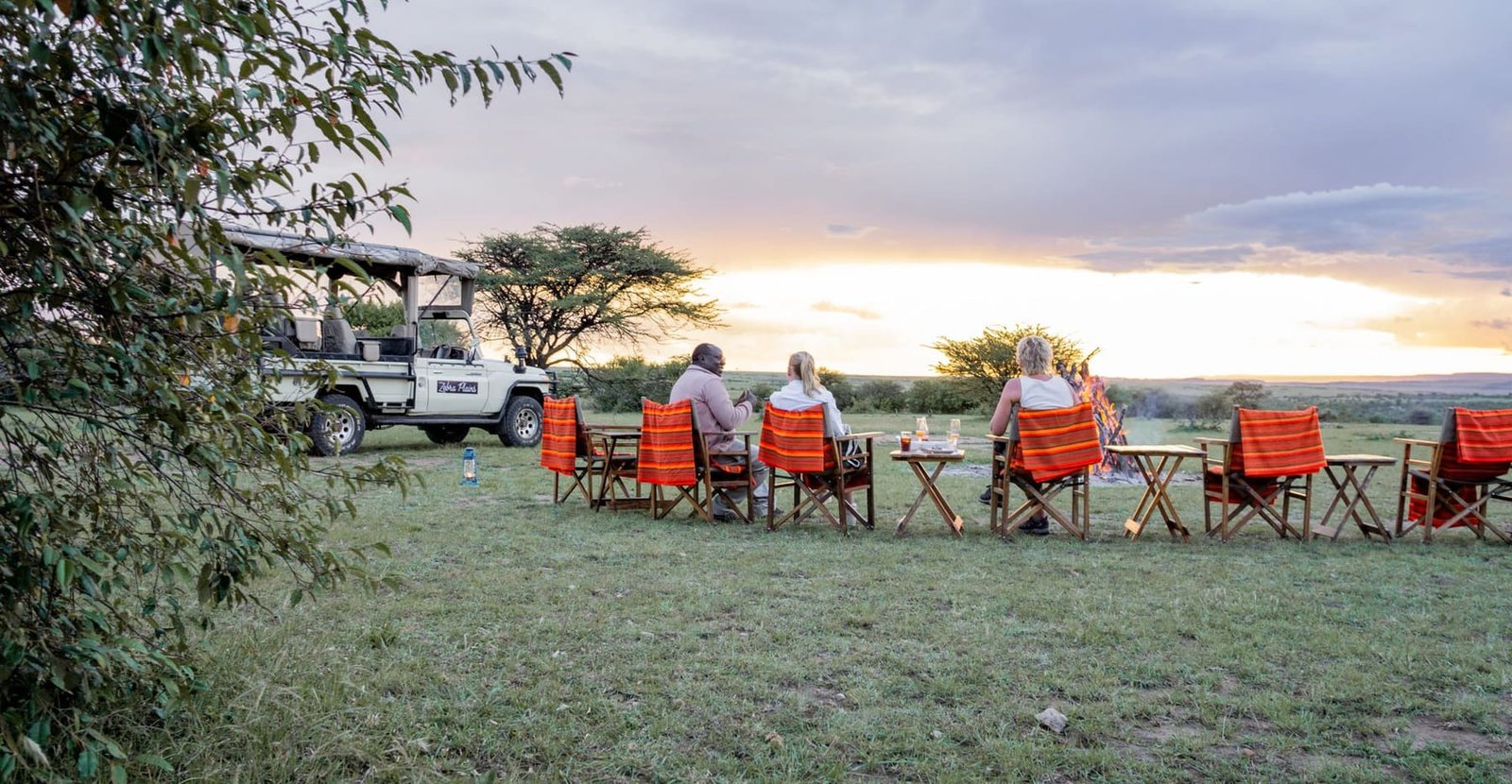 Sundowners on an early-bird Kenya safari